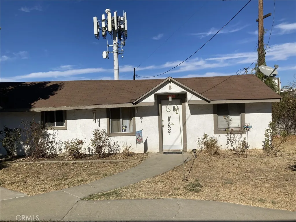 4439 Wade Avenue Perris, CA 92571 - Photo 8 of 11 a very nice looking room with a large window