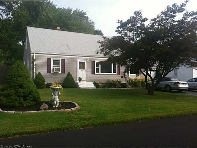 a view of a house with a back yard
