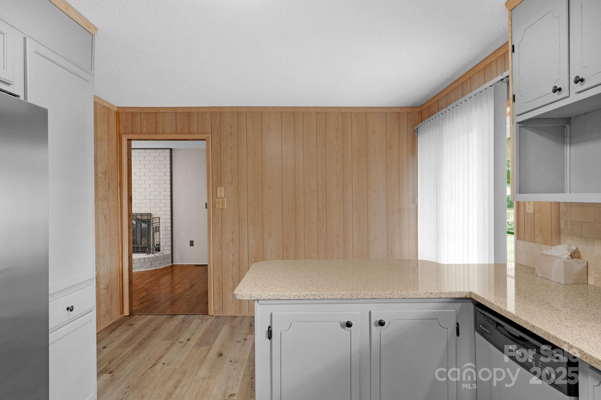 1202 Flowe Drive Matthews, NC 28104 - Photo 17 of 47 a view of a kitchen cabinets a sink and dishwasher in a kitchen
