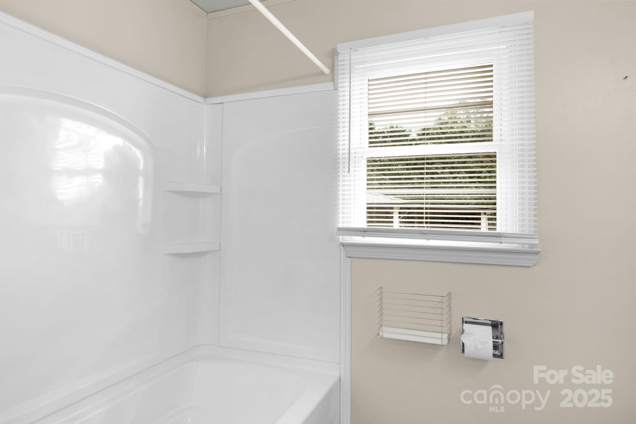 1202 Flowe Drive Matthews, NC 28104 - Photo 22 of 47 a bathroom with a window