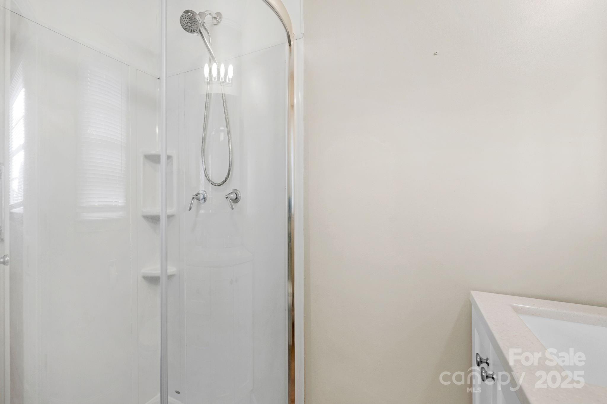 1202 Flowe Drive Matthews, NC 28104 - Photo 27 of 47 a bathroom with a shower