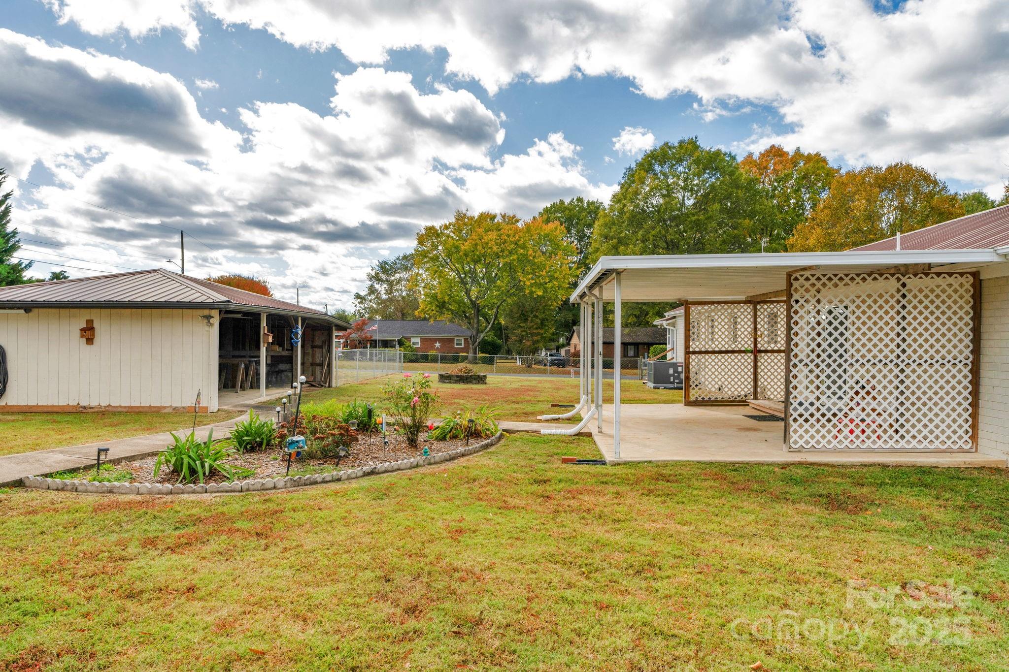 1202 Flowe Drive Matthews, NC 28104 - Photo 35 of 47 a view of a house with a swimming pool