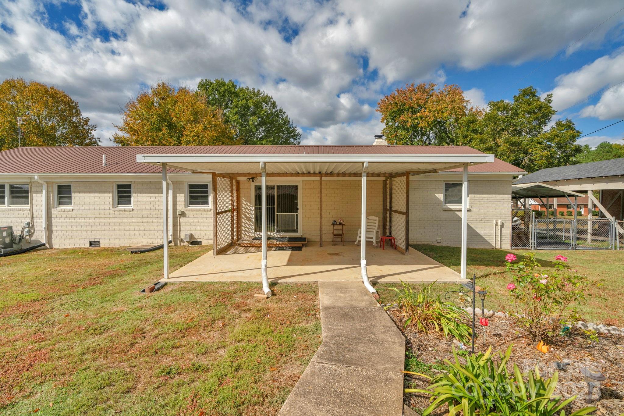1202 Flowe Drive Matthews, NC 28104 - Photo 37 of 47 front view of a house with a porch