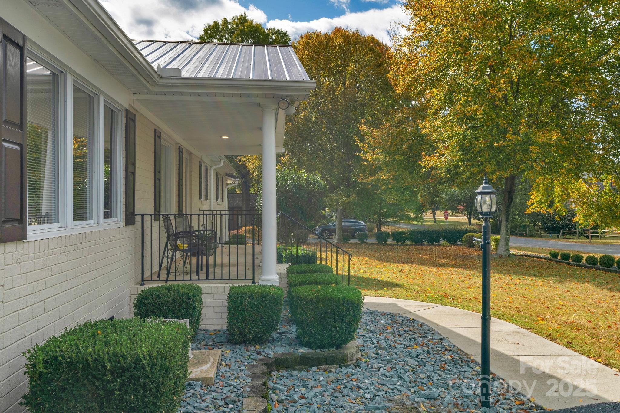 1202 Flowe Drive Matthews, NC 28104 - Photo 40 of 47 a view of a swimming pool with a lounge chair