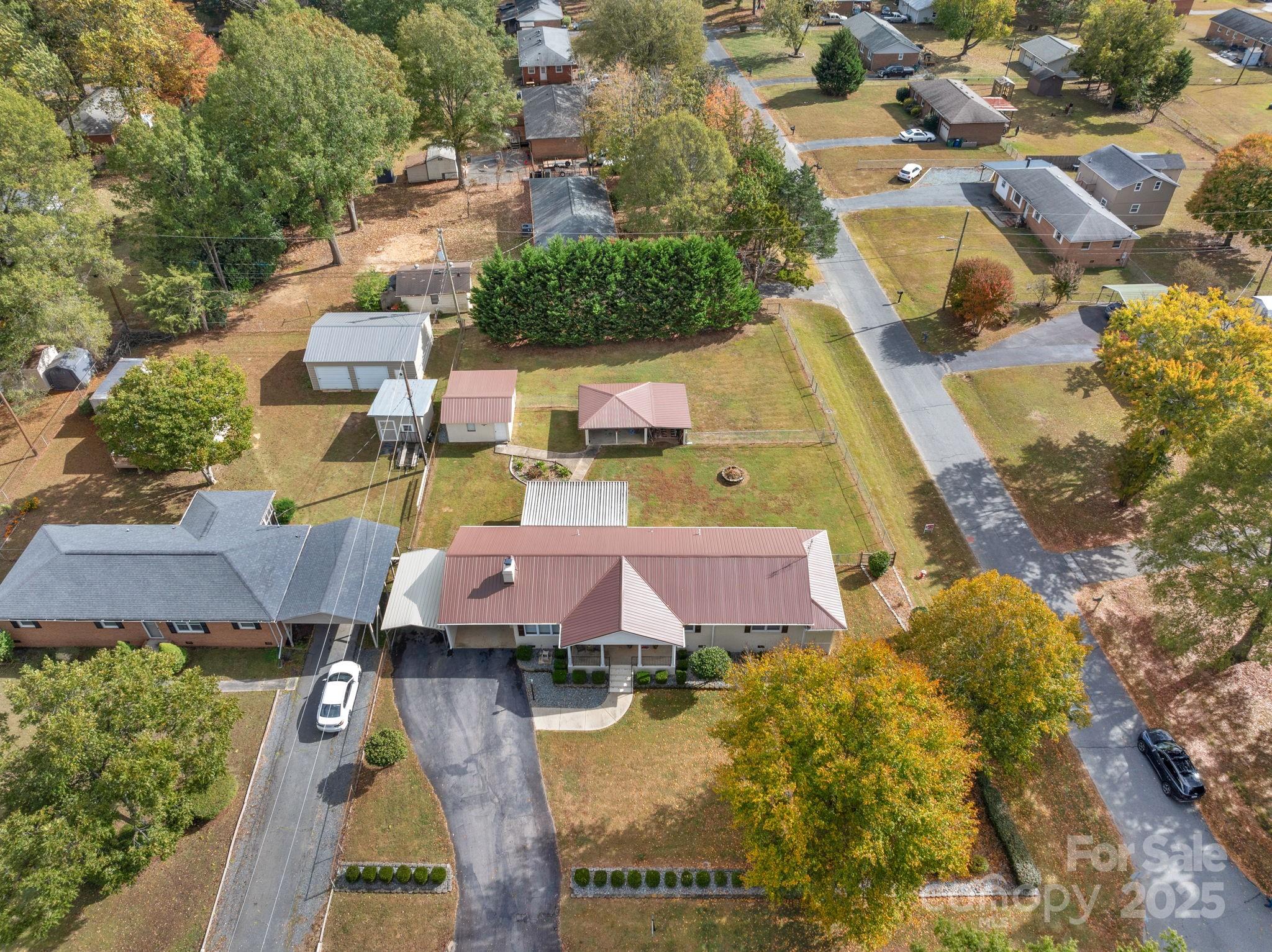 1202 Flowe Drive Matthews, NC 28104 - Photo 41 of 47 an aerial view of residential houses with outdoor space