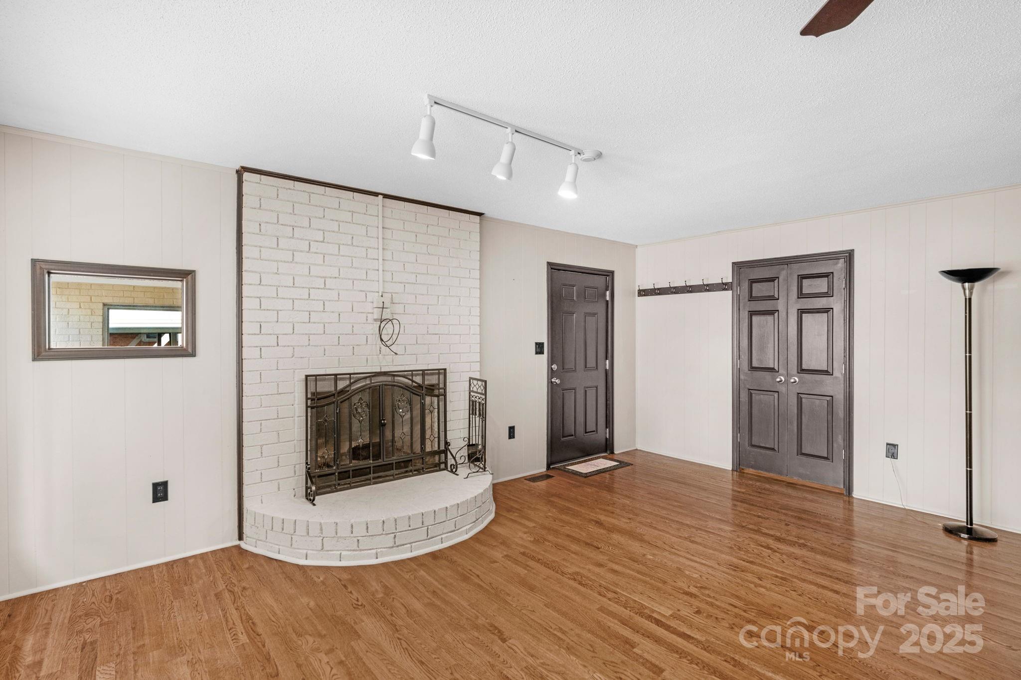 1202 Flowe Drive Matthews, NC 28104 - Photo 9 of 47 a view of a livingroom with a fireplace