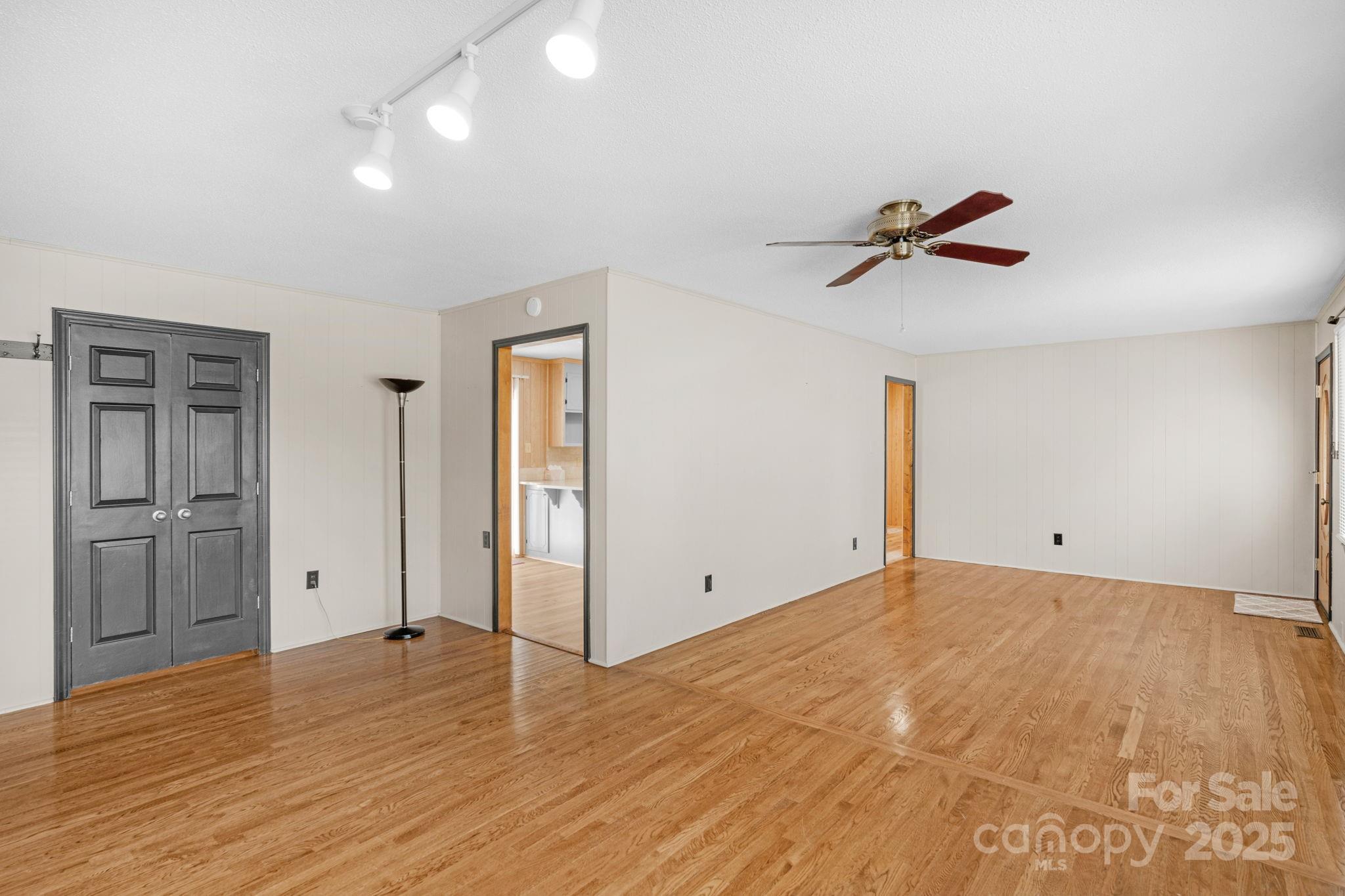 1202 Flowe Drive Matthews, NC 28104 - Photo 10 of 47 a view of empty room with wooden floor