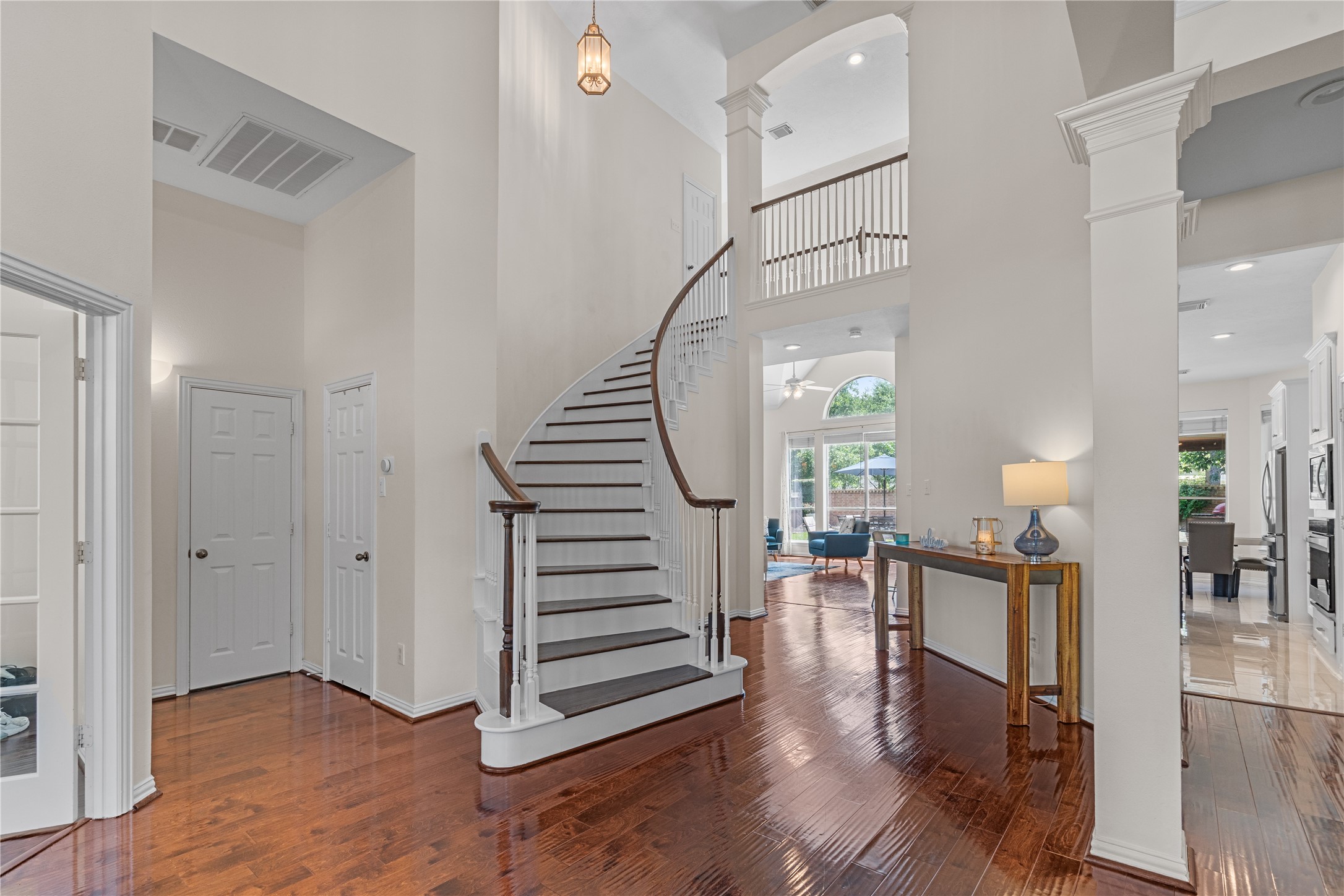 14718 Ramblebrook Humble, TX 77396 - Photo 15 of 38 A striking staircase draws the eye upward, introducing the second level with a sense of scale, flow, and quiet elegance.