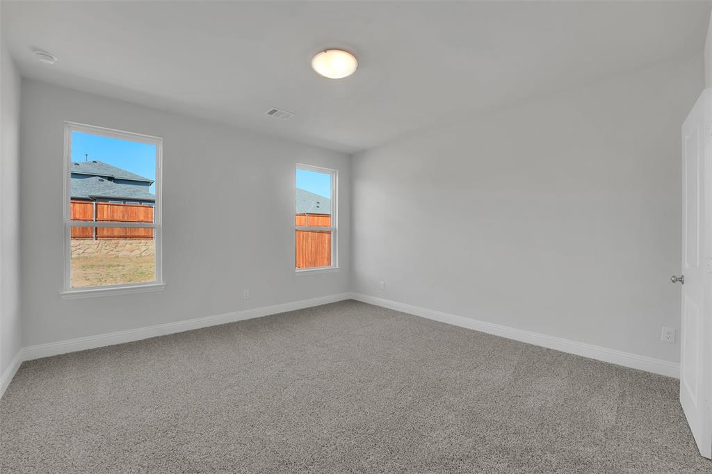 3112 Giovanni Point Princeton, TX 75407 - Photo 18 of 37 an empty room with windows