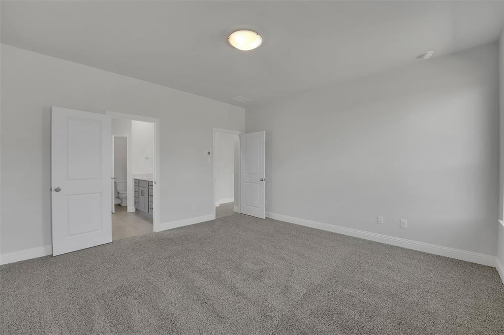 3112 Giovanni Point Princeton, TX 75407 - Photo 19 of 37 a view of an empty room with a fan