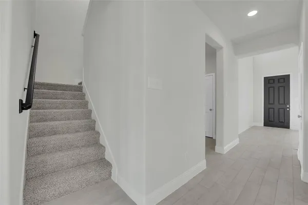 a view of entryway with stairs