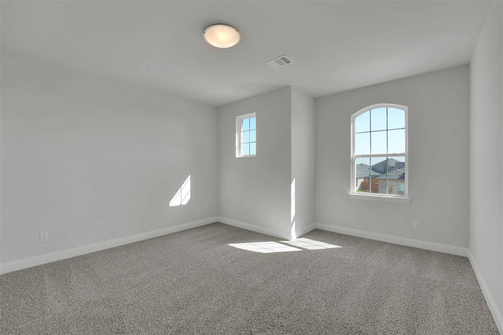 3112 Giovanni Point Princeton, TX 75407 - Photo 29 of 37 an empty room with windows