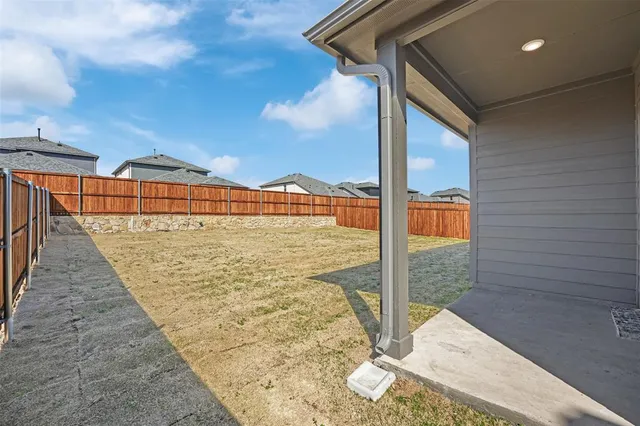 a view of swimming pool with an outdoor seating