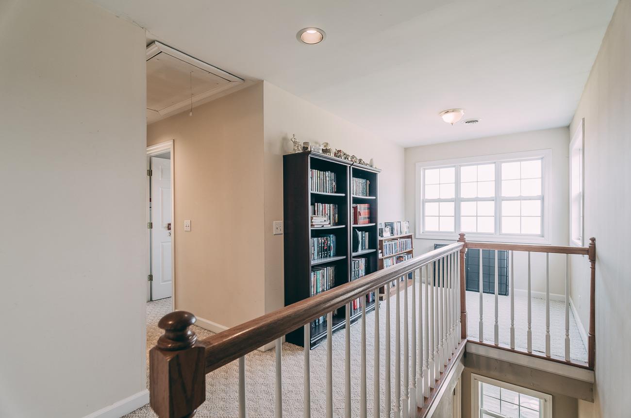6141 Bethlehem Road Springfield, TN 37172 - Photo 18 of 30 Cresting the main stairs and looking out more front windows. Both the view and the natural light are incredible!