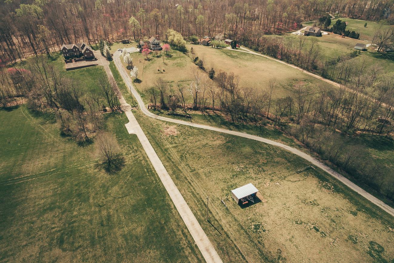 6141 Bethlehem Road Springfield, TN 37172 - Photo 25 of 30 The extreme front of the property is cut off in this photo, but it is still easy to see the driveway as it begins on the far right side of the property, makes a diagonal with the trees and creek, and continues on up to the beautiful Victorian.