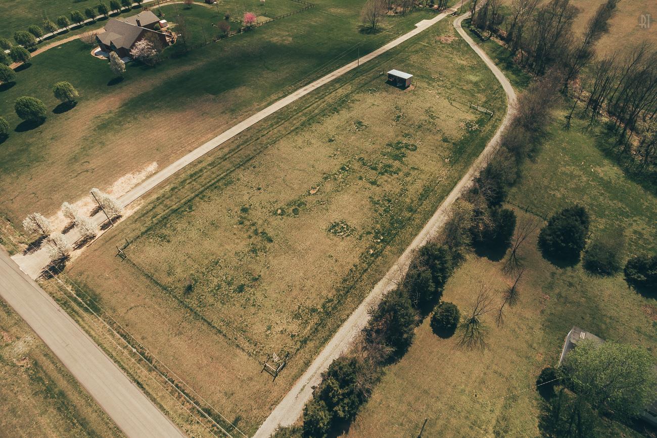 6141 Bethlehem Road Springfield, TN 37172 - Photo 29 of 30 The forward most section of the property, with the driveway starting out on the right and then angling across to the left side. Shelter is visible within the fence.