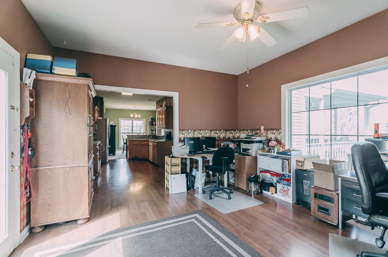6141 Bethlehem Road Springfield, TN 37172 - Photo 8 of 30 This delightful room is just off of the kitchen and continues on to the bonus room stairs and entry to the two car garage. Window on the right looks over the front property and glass door on the left looks over the back yard.