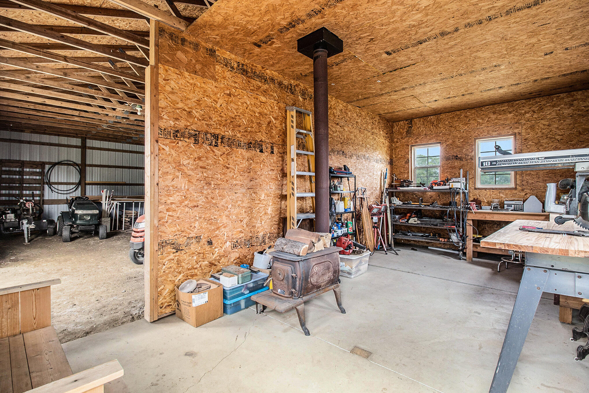 10321 Chase Lake Road Fowlerville, MI 48836 - Photo 58 of 69 Workshop w Woodstove