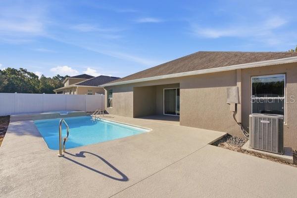 10120 Ives Loop Hudson, FL 34667 - Photo 11 of 23 a house view with a backyard space