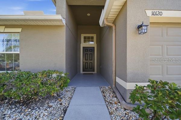 10120 Ives Loop Hudson, FL 34667 - Photo 2 of 23 a view of entrance