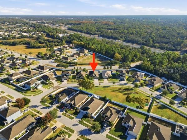 10120 Ives Loop Hudson, FL 34667 - Photo 23 of 23 an aerial view of residential houses with outdoor space