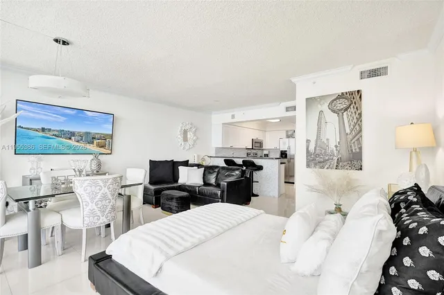 a bedroom with a bed and furniture