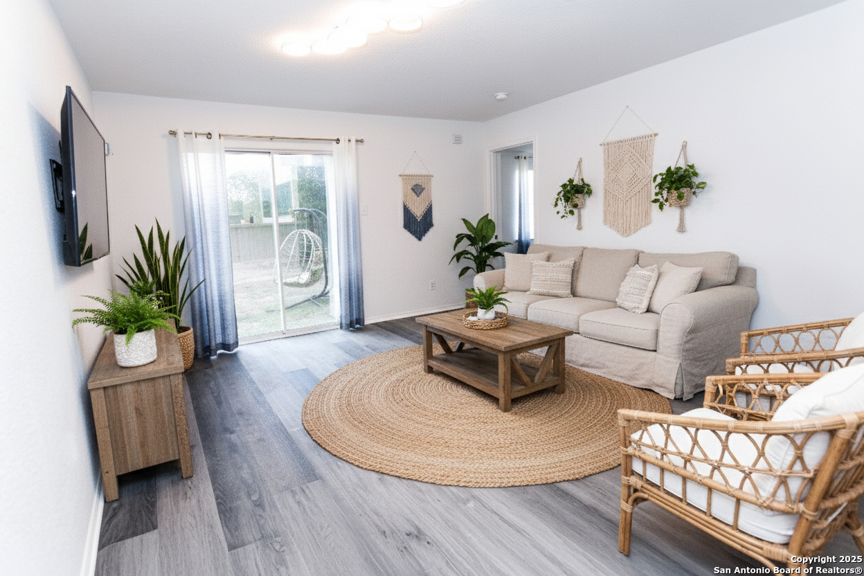 2311 Cloudbait View Converse, TX 78109 - Photo 2 of 20 a living room with furniture and a potted plant
