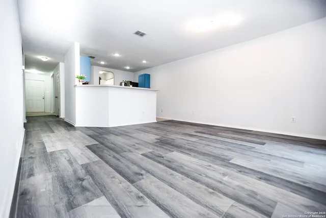 a view of a kitchen and a sink