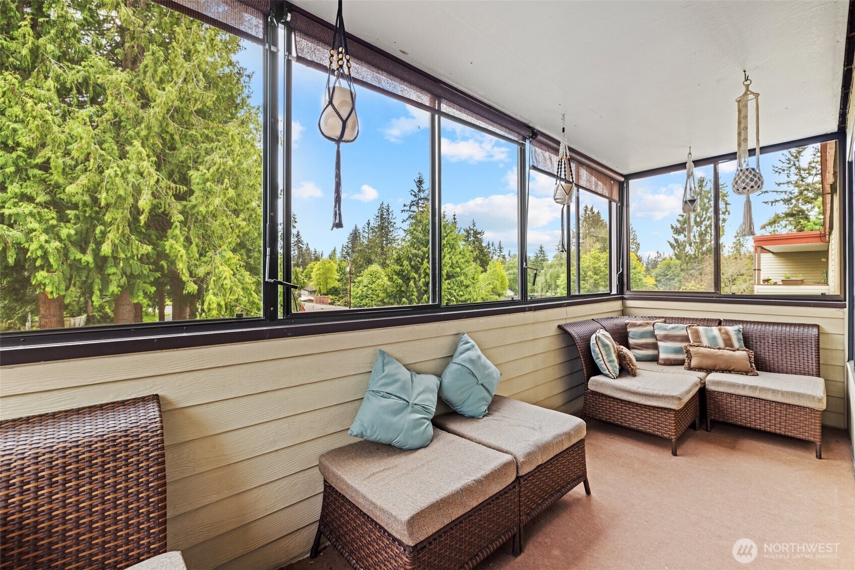 8516 196th Street Southwest, Unit 311 Edmonds, WA 98026 - Photo 19 of 28 a living room with furniture and a large window