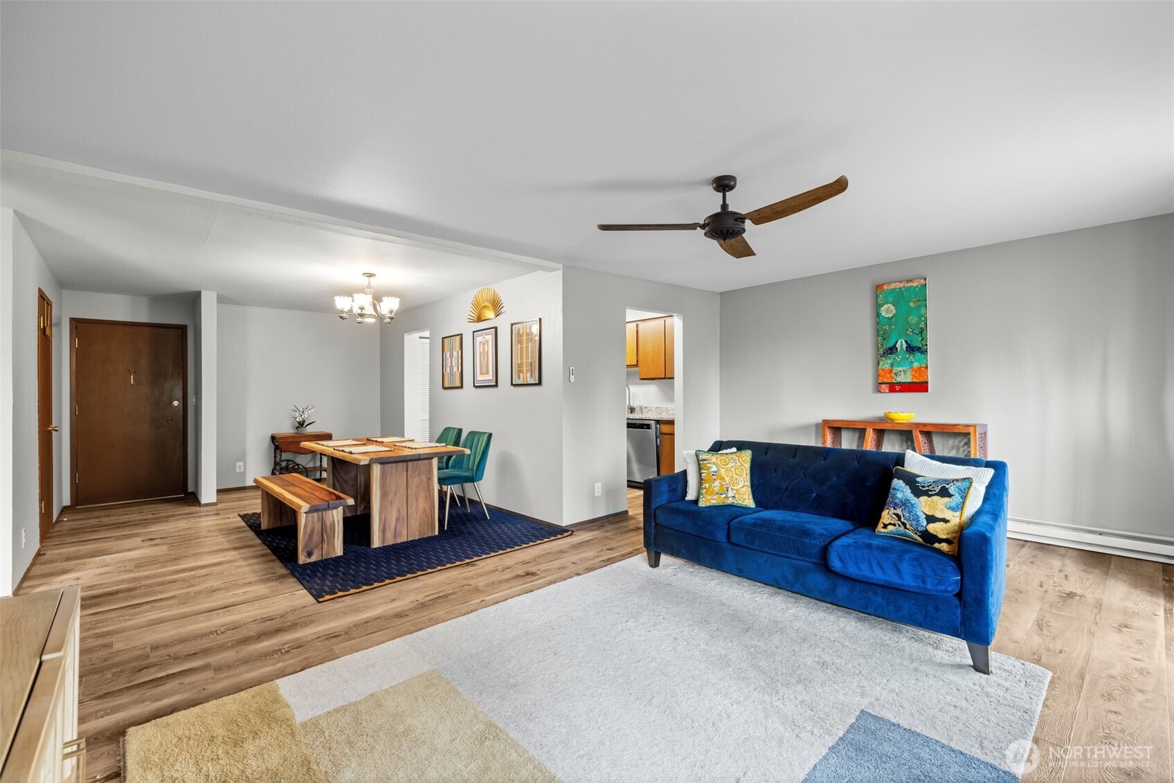 8516 196th Street Southwest, Unit 311 Edmonds, WA 98026 - Photo 5 of 28 a living room with furniture and a ceiling fan