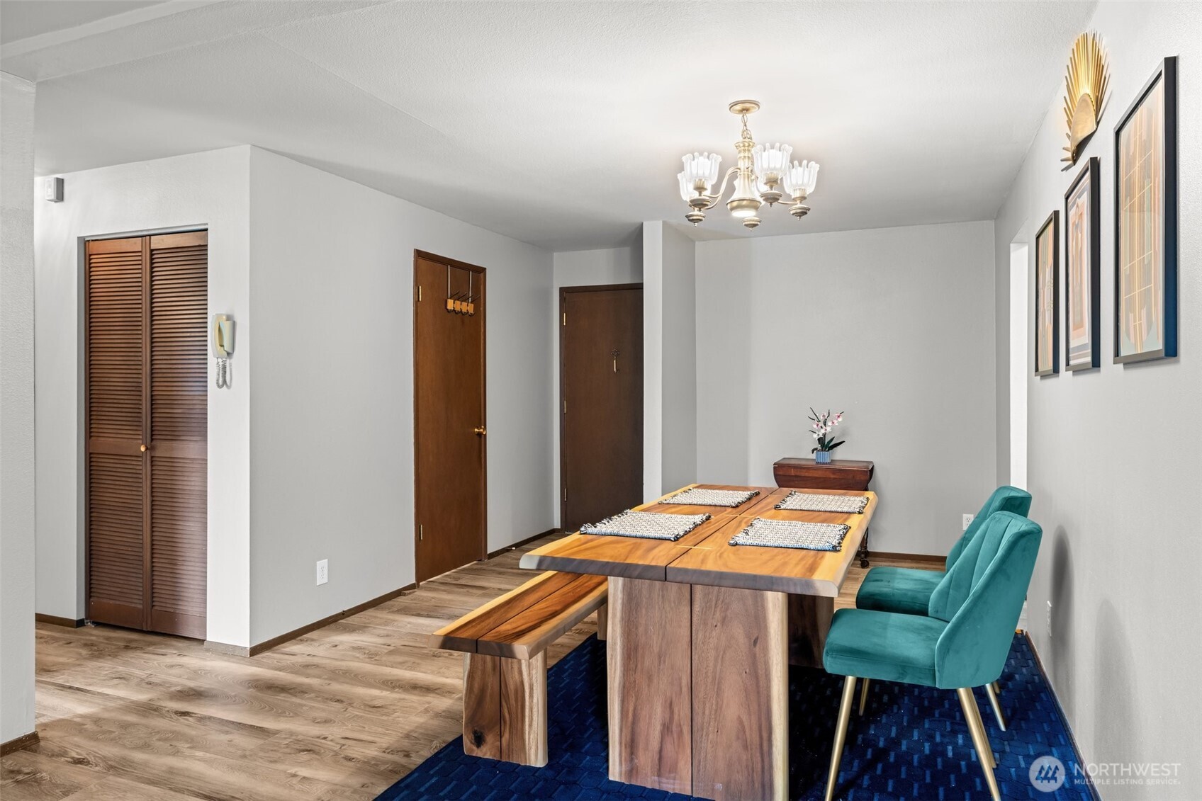 8516 196th Street Southwest, Unit 311 Edmonds, WA 98026 - Photo 7 of 28 a dining room with a table and chairs