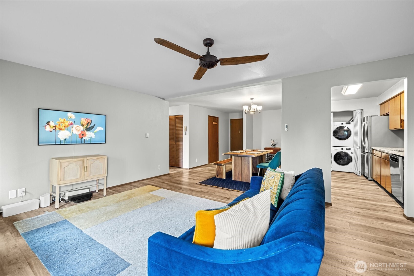 8516 196th Street Southwest, Unit 311 Edmonds, WA 98026 - Photo 8 of 28 a living room with furniture and a wooden floor