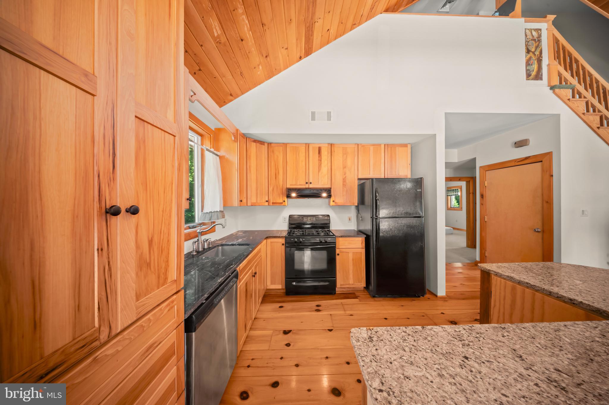 1473 North River Road Yardley, PA 19067 - Photo 14 of 42 a kitchen with refrigerator and window
