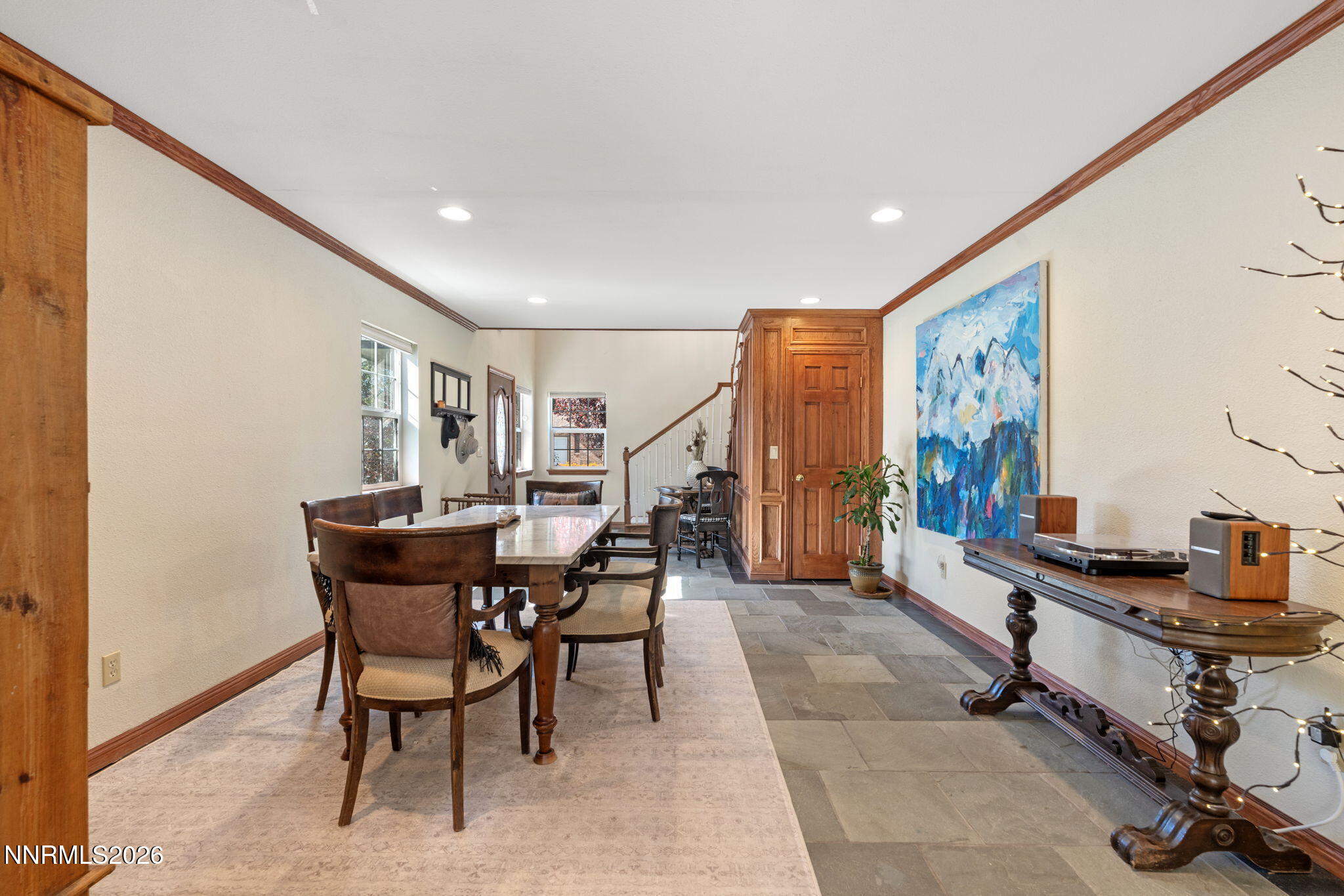 300 Country Club Drive Reno, NV 89509 - Photo 7 of 48 a dining room with furniture and wooden floor
