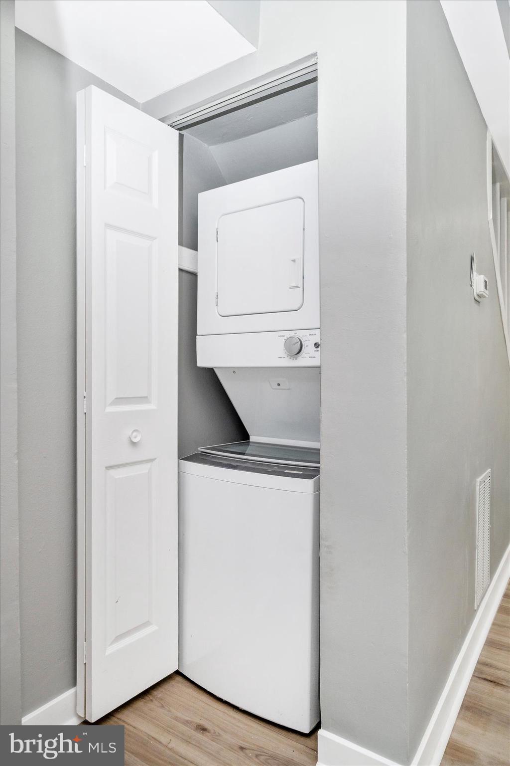 5027 Benning Road Southeast Washington, DC 20019 - Photo 21 of 57 a utility room with dryer and washer