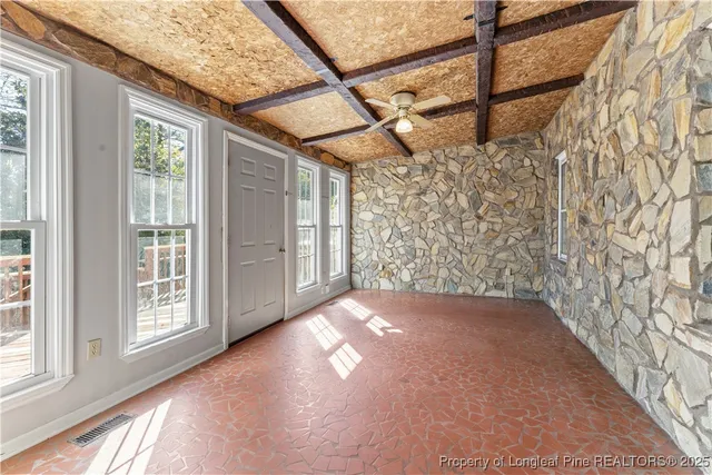 a view of a big room with a large windows