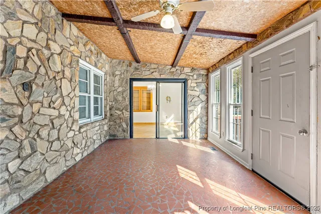 a view of entryway with a front door