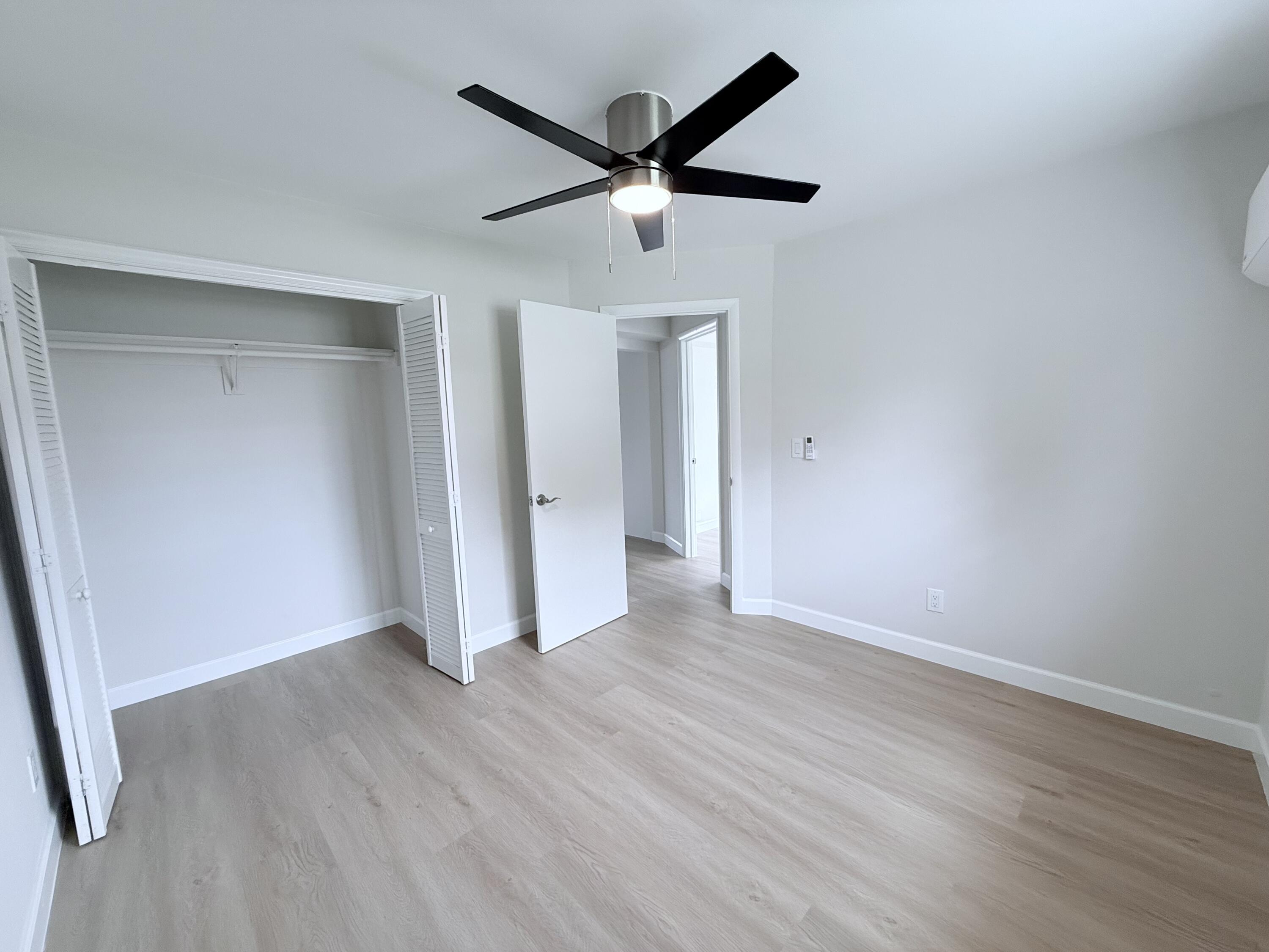 2401 Patterson Avenue, Unit 101 Key West, FL 33040 - Photo 12 of 26 wooden floor in an empty room