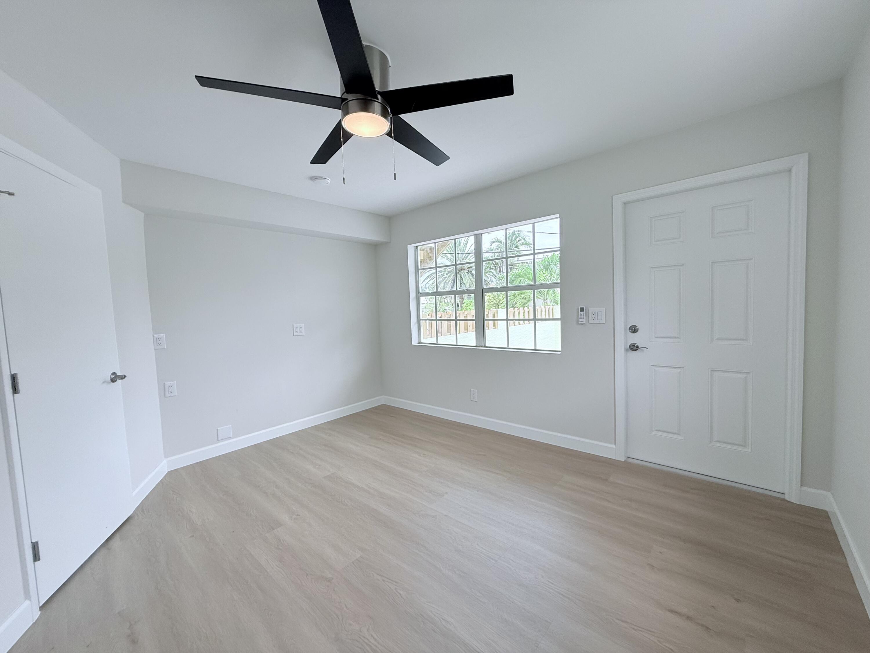 2401 Patterson Avenue, Unit 101 Key West, FL 33040 - Photo 16 of 26 a view of an empty room with a window