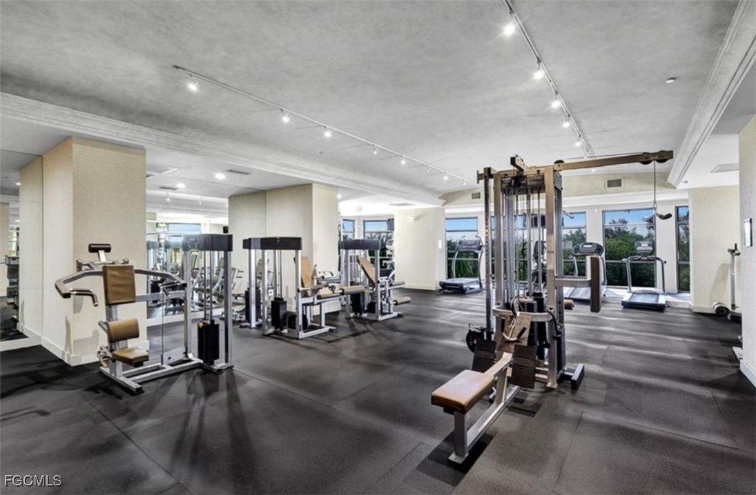 14380 Riva Del Lago Drive, Unit 1002 Fort Myers, FL 33907 - Photo 20 of 23 a view of a room with gym equipment