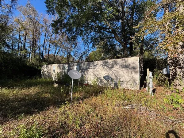 a view of water pond with seating space