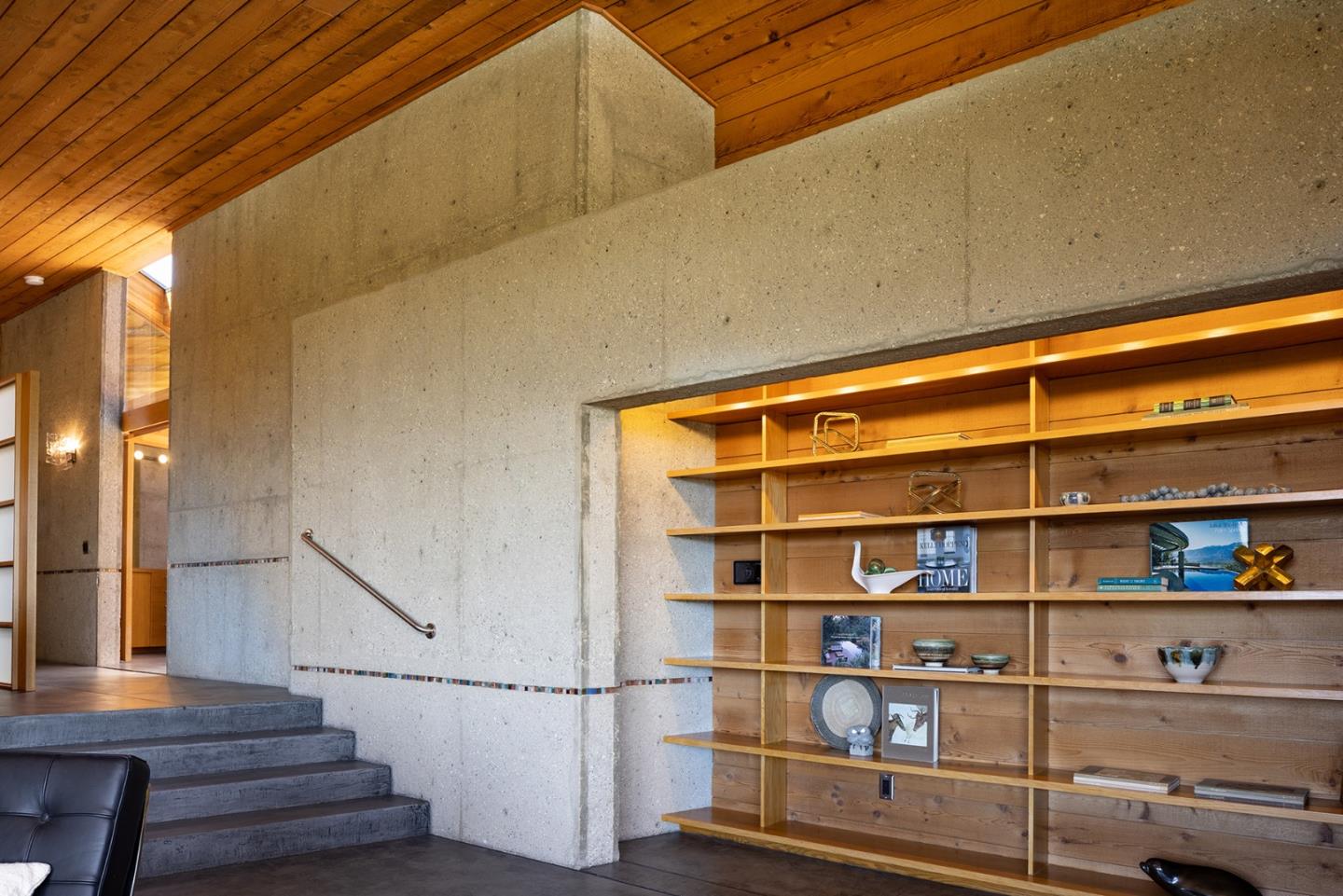 26225 Rinconada Drive Carmel Valley, CA 93924 - Photo 13 of 44 a view of a hallway with wooden floor and entryway