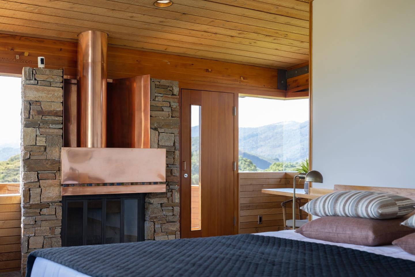 26225 Rinconada Drive Carmel Valley, CA 93924 - Photo 22 of 44 a living room with furniture and a fireplace