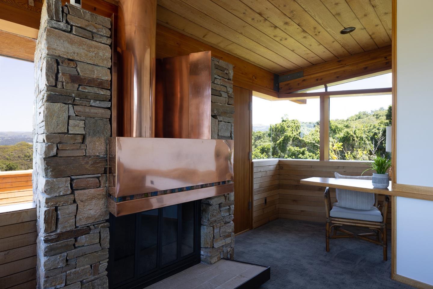 26225 Rinconada Drive Carmel Valley, CA 93924 - Photo 24 of 44 a balcony with furniture and outdoor view