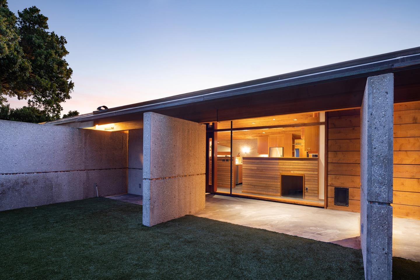 26225 Rinconada Drive Carmel Valley, CA 93924 - Photo 37 of 44 a view of empty room with a fireplace and wooden floor