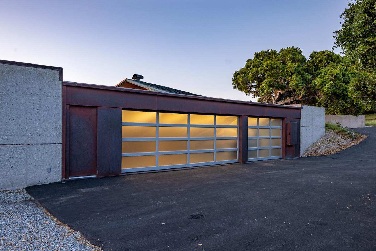 26225 Rinconada Drive Carmel Valley, CA 93924 - Photo 38 of 44 a view of an empty room with a floor to ceiling window and tree