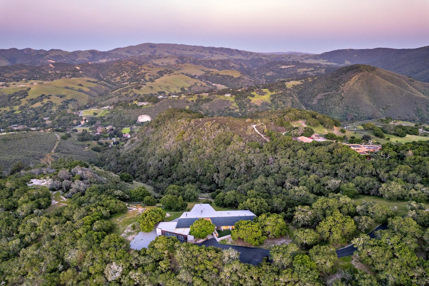 26225 Rinconada Drive Carmel Valley, CA 93924 - Photo 43 of 44 an aerial view of a town with trees