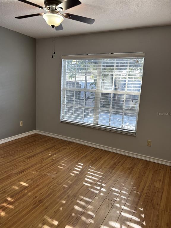 1927 Cheney Court Lutz, FL 33549 - Photo 16 of 20 a view of an empty room with a window