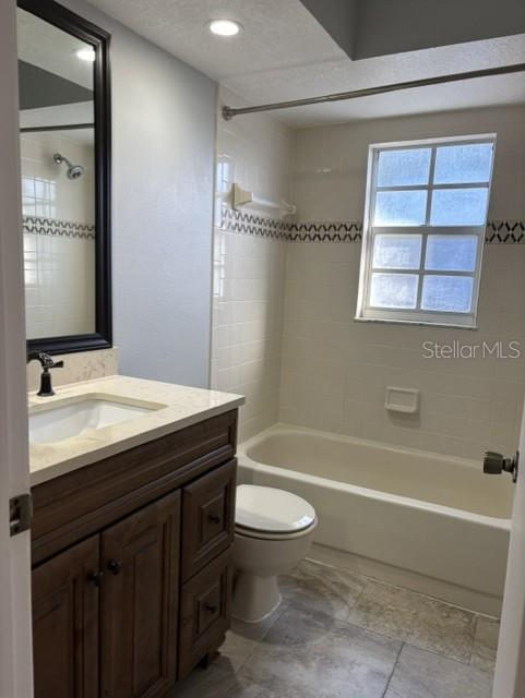 1927 Cheney Court Lutz, FL 33549 - Photo 17 of 20 a bathroom with a sink a toilet and shower