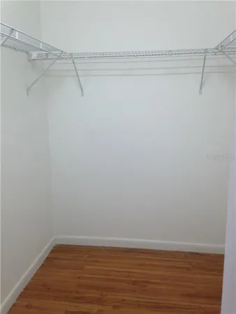 a view of a room with racks on the wall